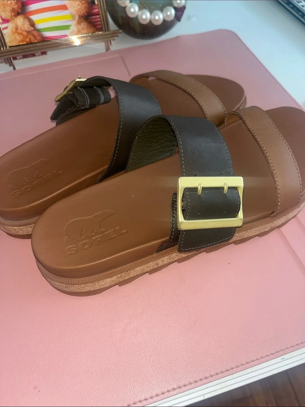 Sorel Roaming Buckle Two-Tab Slide Sandals in Black and Brown